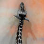 Giraffe with a dragon shadow