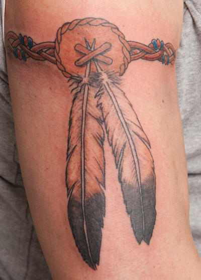 Indian feather tattoo