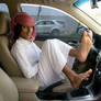 Saudi Arab teen boy feet in car
