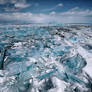 2 persons walking on shattered ice