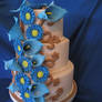 Blue daisy and calla lily cake