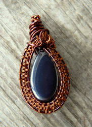 Wire wrapped pendant with hematite