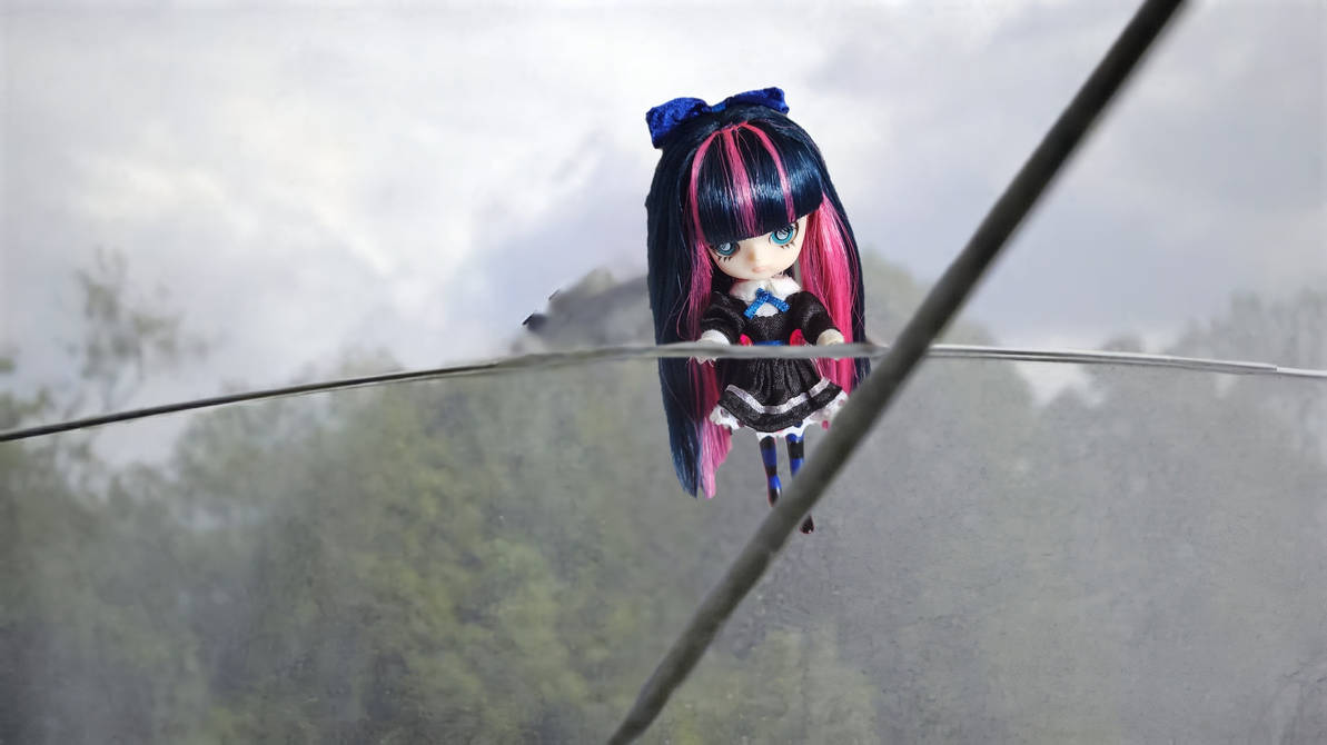 Stocking doll on a tightrope by SwordodinX on DeviantArt