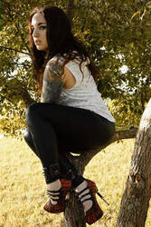 only badasses climb trees in heels