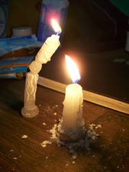 2 candles in the dark .