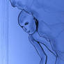 The figure becomes visible from behind the rock..