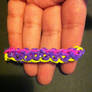 Purple, pink and yellow loom bracelet