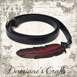 Loop belt with feather in leather