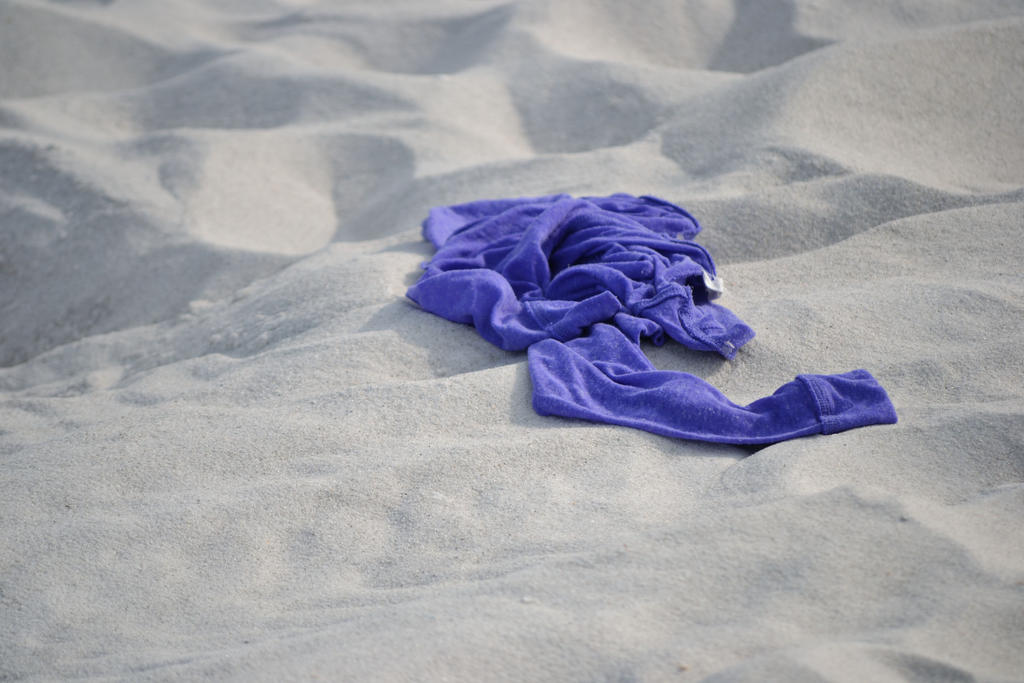 purple clothing at beach