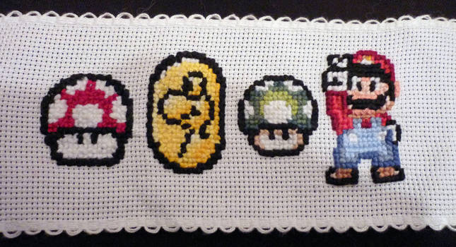 Embroidered Yoshi coin, 1 Up mushroom and Mario