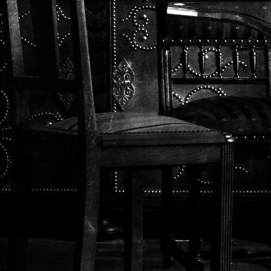 Two dark chairs