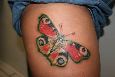 peacock butterfly tattoo close