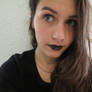 Goth makeup.