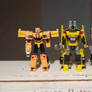 Three yellow Autobots 