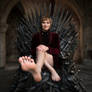 Cersei's feet on the iron throne