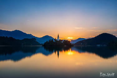 Sunrise over Lake Bled Monastery