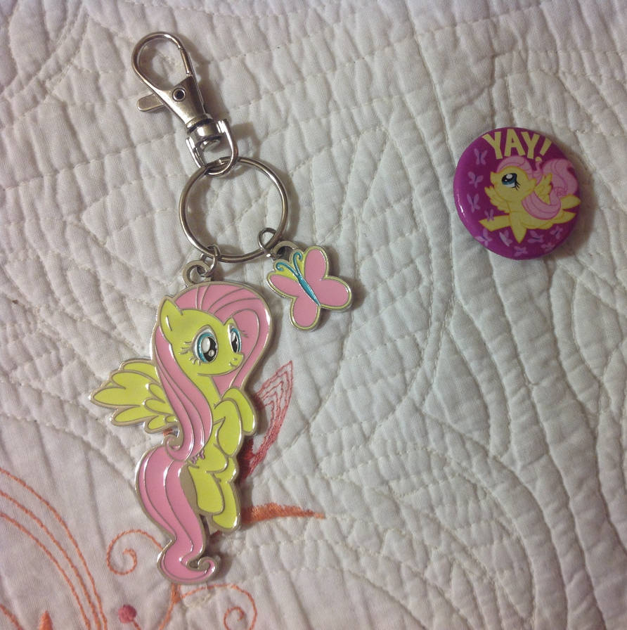 I got Fluttershy keychain and badge at Hot Topic by BerryViolet on