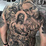 Religious backpiece tattoo