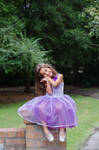 Ella purple dress sitting pose 3