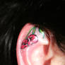 Cherry Ear Skull Tattoo