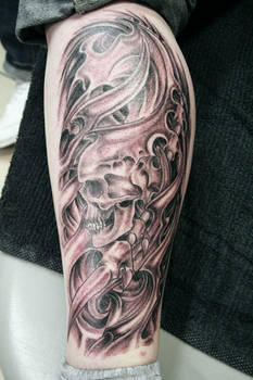 Biomechanic Skull Leg Tattoo