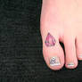 Brilliant on a toe Tattoo