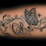 Butterfly chicano style tat