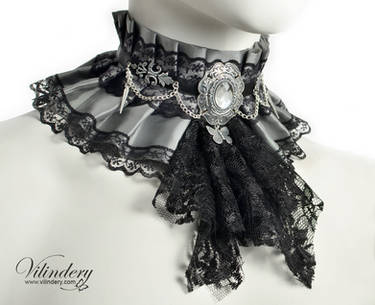 Fantasy collar with a black jabot and butterfly