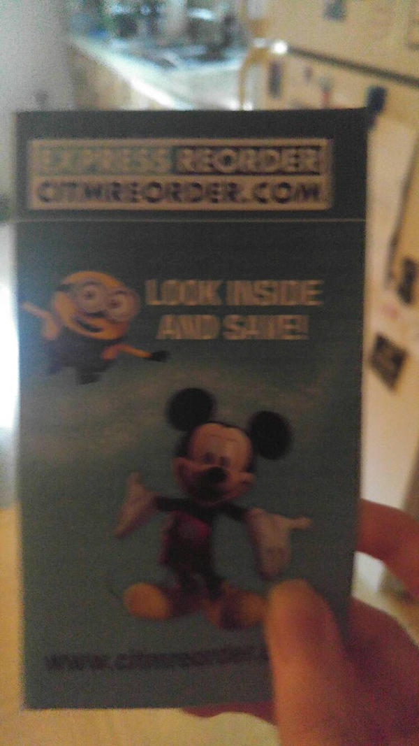 Mickey mouse and a minion on the same card