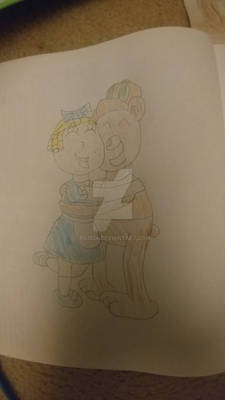 Goldie gets a bear hug