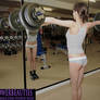 YOUNG GIRL DOING SOME EASY WEIGHT TRAINING