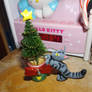 Kitty climbing christmas  tree