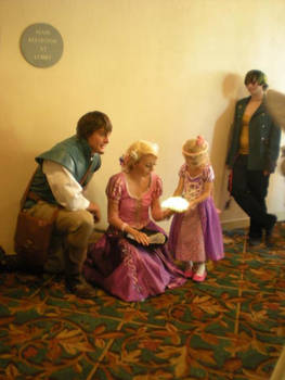 Rapunzel and Pascal meet mini Rapunzel