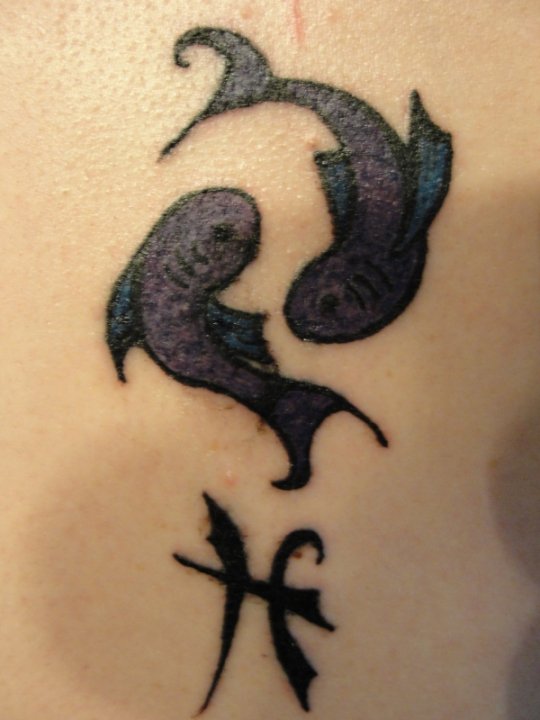 first tattoo - pisces symbols