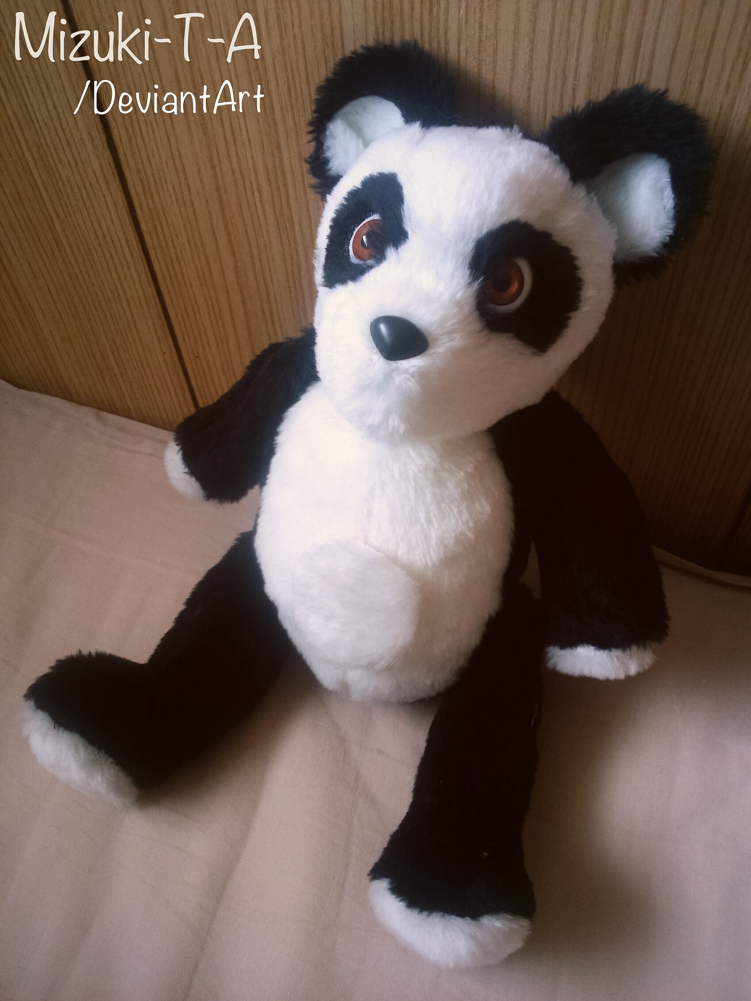 Handmade plushie of panda