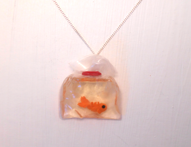 Handmade miniature goldfish in a bag necklace.