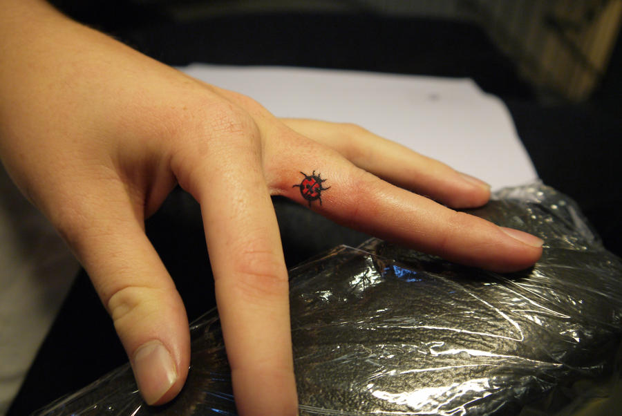 Ladybug tattoo