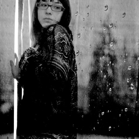 ID with glasses and raindrops