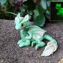 Fully Photoluminous Green Dragon with Silver Dots