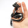 Kylio - Black and bronze dragon figurine