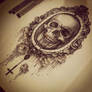 Skull with rosary.