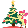 Apple Bloom decorates the Hearth's Warming Tree