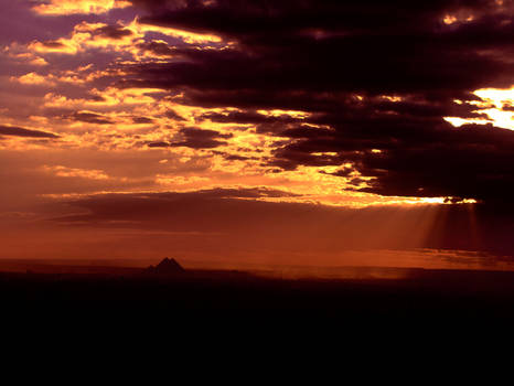 Pyramids and sun