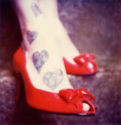 Red shoes and tatoos