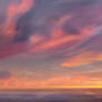 Sunset Over Distant Ocean