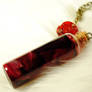 Blood and rose vial rosary