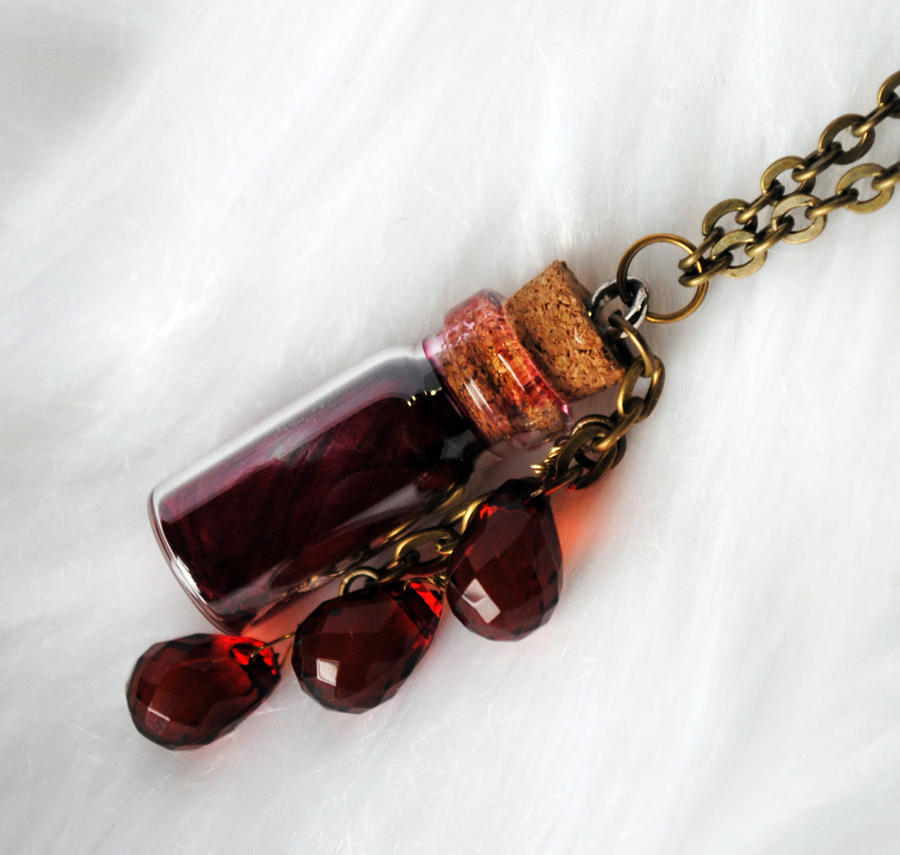 Blood vial and drop necklace by OphanimGothique on DeviantArt.