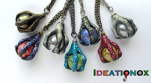 Crystal Ball and Claw Necklaces