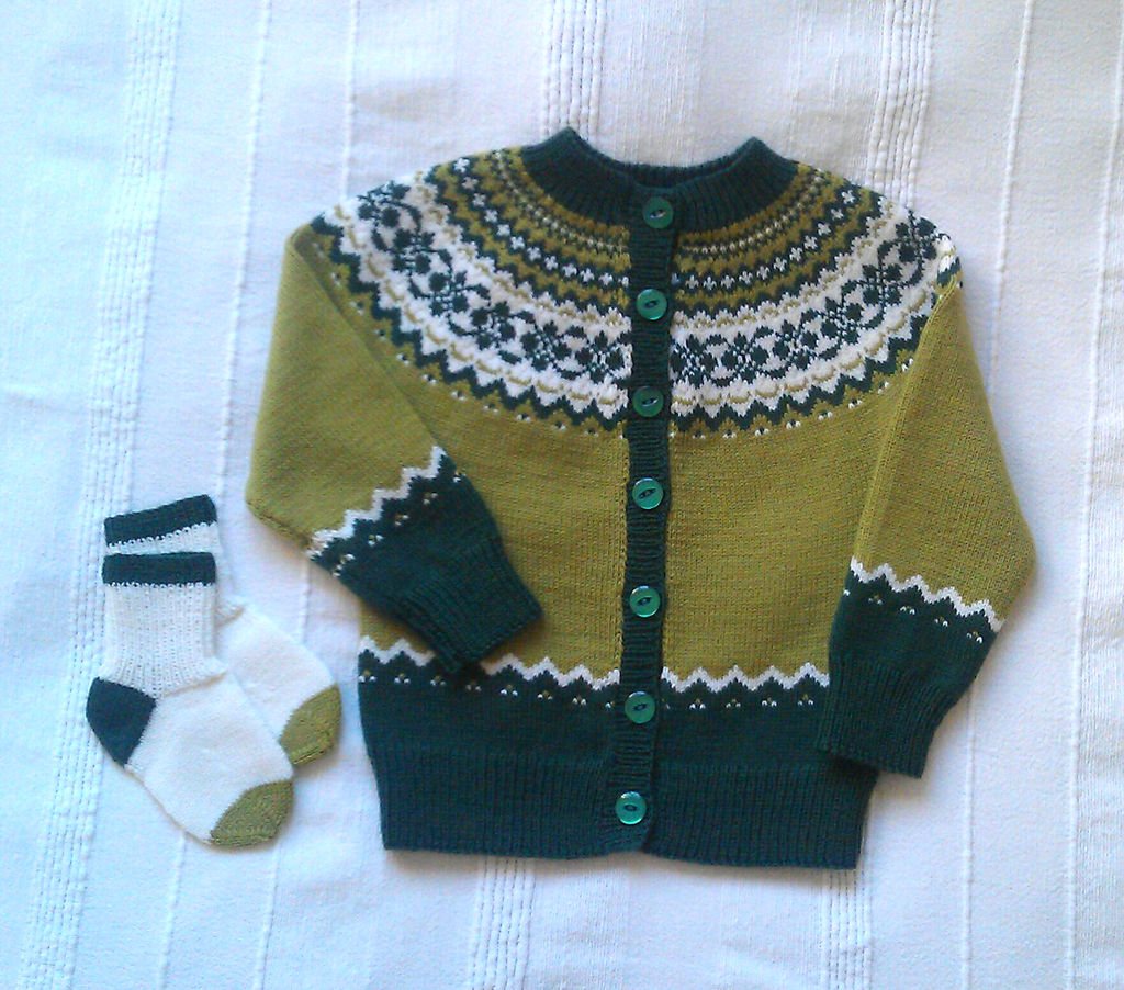 Knitted green jacket for toddlers