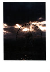 Big wheel at Paris clouds